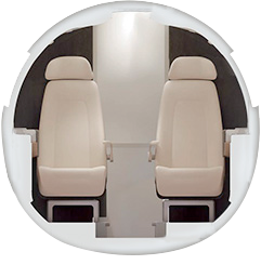 Phenom 300 cabin cutaway showing seating layout and dimensions